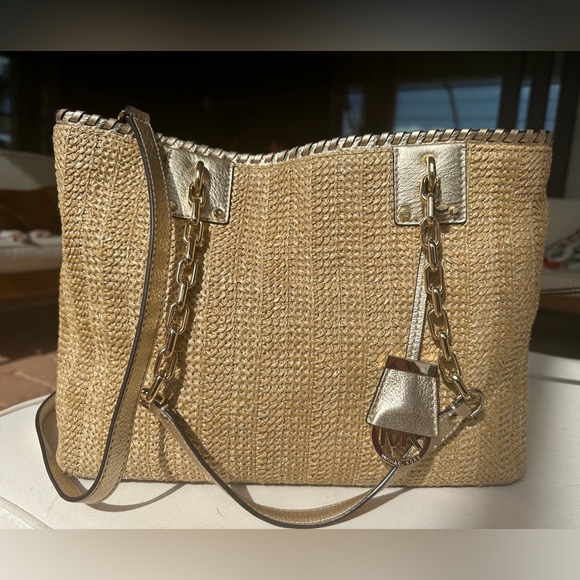 Michael Kors Handbags - NWOT Micheal Kors gold purse